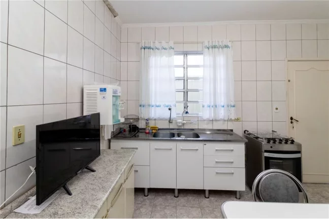 Imagem Sobrado com 5 casas e 1 galpão - Oportunidade de investimento ou moradia