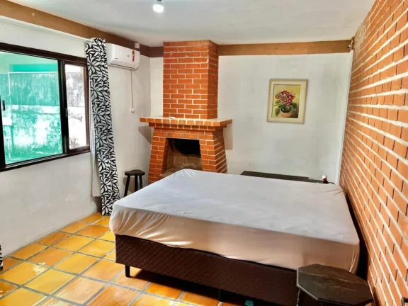 Imagem Casa mobiliada com 3 dormitórios sendo uma suíte para temporada no Centro Penha