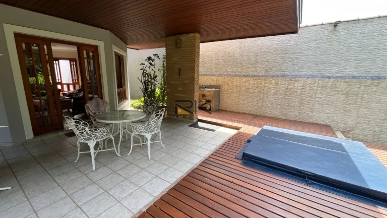 Imagem CASA EM CONDOMÍNIO COM 6 SUÍTES,SALA DE ESTAR E JANTAR,SALA DE TV,30 METROS DA ORLA,3 VAGAS DE GARAGEM