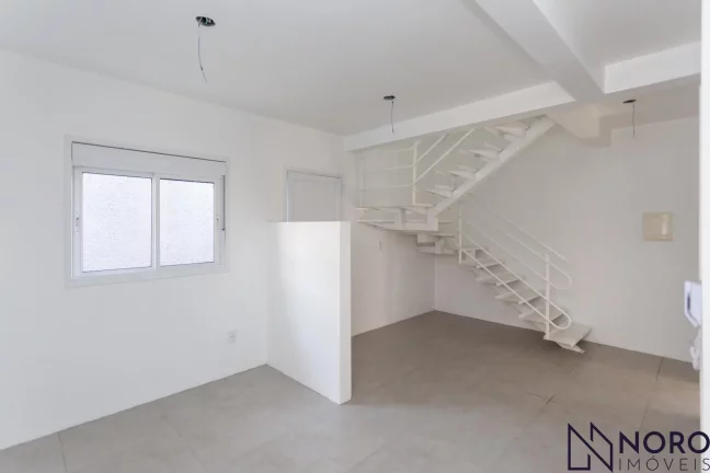 Imagem Casa em Residencial Fechado com Terraço e 2 Dormitórios em Santa Maria