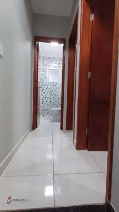 Imagem Sobrado com 2 dormitórios à venda, 58 m² por R$ 320.000,00 - Maracanã - Praia Grande/SP