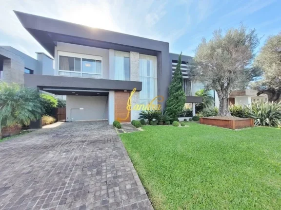 Imagem Casa condomínio com 05 suites e piscina aquecida