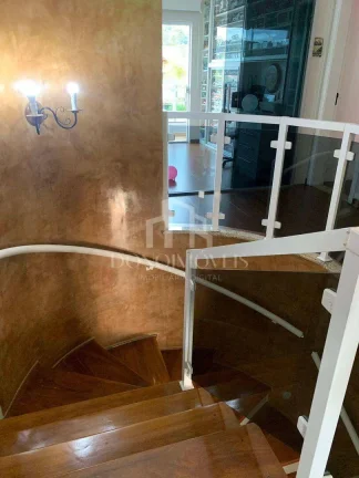 Imagem Casa alto padrão 318m² | 4 suítes | Piscina aquecida | 7 vagas | Swiss Park