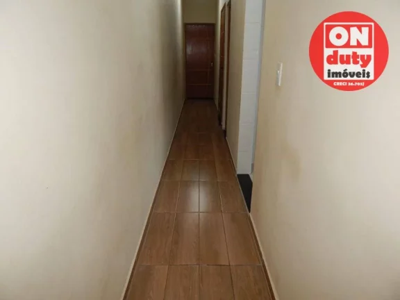 Imagem Casa com 2 dormitórios à venda, 73 m² por R$ 320.000,00 - Areia Branca - Santos/SP
