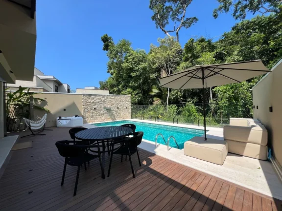 Imagem Casa de Luxo à Venda em Riviera de São Lourenço Módulo 24: 5 Quartos, 5 Suítes, 3 Salas, 6 Vagas de Garagem, 395,00m² de Área
