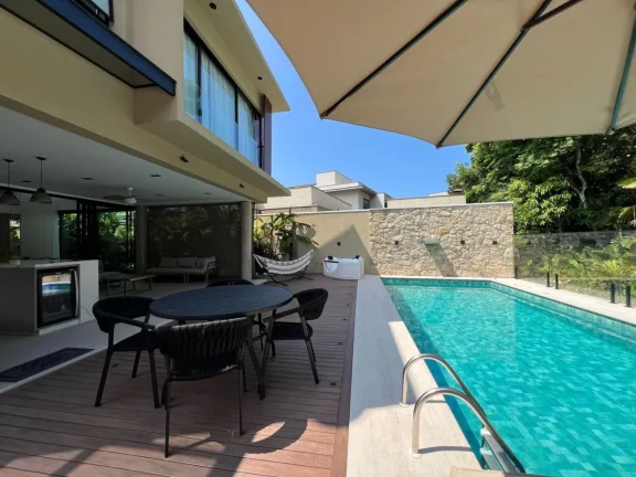 Imagem Casa de Luxo à Venda em Riviera de São Lourenço Módulo 24: 5 Quartos, 5 Suítes, 3 Salas, 6 Vagas de Garagem, 395,00m² de Área