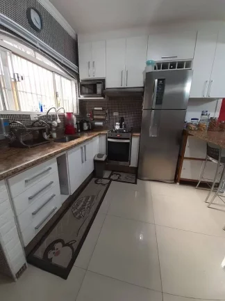 Imagem Sobrado com 3 dormitórios à venda, 270 m² por R$ 1.100.000,00 - Vila Pires - Santo André/SP