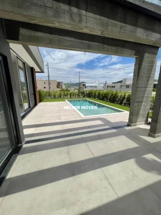 Imagem Casa Alto Padrão à venda localizada em condomínio fechado em Camboriú - SC