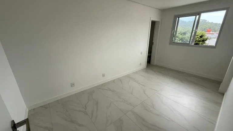 Imagem Apartamento novo de 74 m² com 2 quartos, sendo 1 suíte no bairro Fazenda em Itajaí a venda com Adriano Carpes Imóveis.