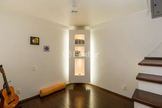 Imagem Casa em Condomínio 3 dorms à venda Avenida Vicente Monteggia, Cavalhada - Porto Alegre