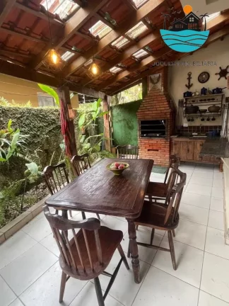 Imagem Casa em condomínio para venda em Juquehy com 3 dormitórios, 1 suíte, 50 metros da praia e 160m² de área construída | Juquehy Imobiliária