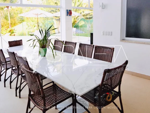 Imagem Oásis de Luxo: Casa térrea com piscina, sauna e píer privativo à venda no condomínio Marina Guarujá