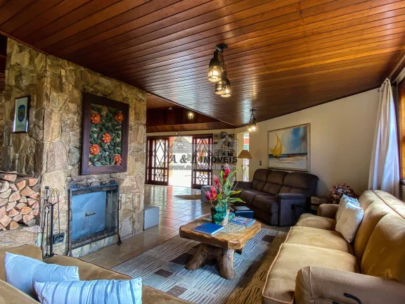 Imagem Casa à venda em Campos do Jordão – Linda casa com 7 suítes