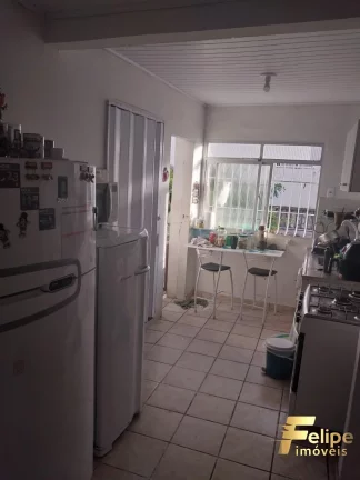 Imagem GRANDE CASA COM 1 LOJA COMERCIAL NO CENTRO DE GUARAPARI