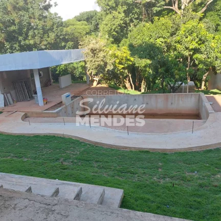 Imagem Imponente residência 402 m² com 5 suítes e complexo de lazer privativo