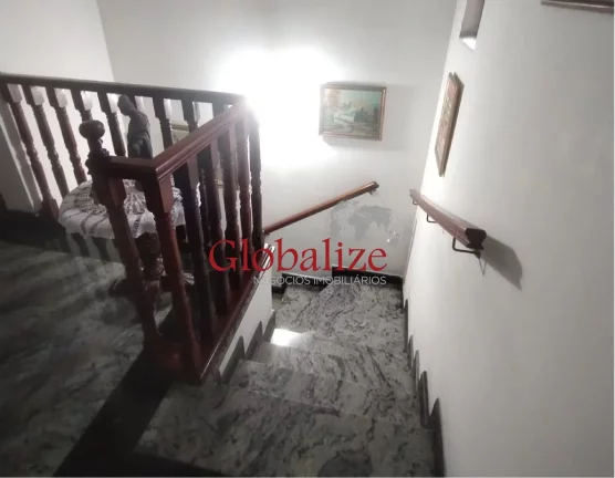 Imagem Belíssimo sobrado em Santos no bairro do Embaré com 4 dormitórios, duas suítes, duas vagas e quintal com churrasqueira à venda por R$ 1.490.000,00