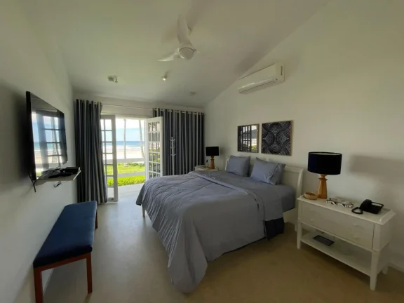 Imagem Casa única na Riviera de São Lourenço: Módulo 5: 6 quartos, 6 suítes. Pé na areia frontal, vista para o mar e amplo espaço gourmet.