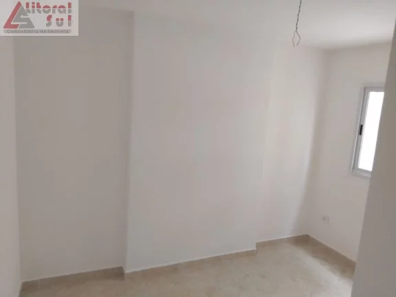 Imagem Apartamento à venda na Guilhermina, Praia Grande-SP: 2 quartos, 1 suíte, 1 vaga de garagem e 56m² de área. Adquira já!