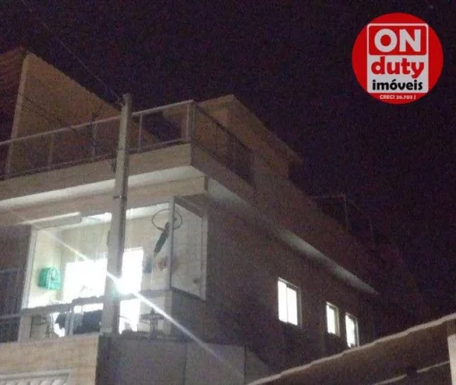 Imagem Sobrado com 2 dormitórios à venda, 135 m² por R$ 540.000,00 - Vila Santa Rosa - Guarujá/SP
