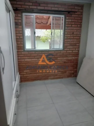 Imagem Adriano Carpes Imóveis vende terreno escritura com 2 casas no Centro de Navegantes/SC no litoral Norte de Santa Catarina