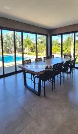 Imagem Sobrado de alto padrão em Cambé: 3 suítes, piscina aquecida, casa de visitas, pomar, energia solar e 3.000m² de terreno amplo