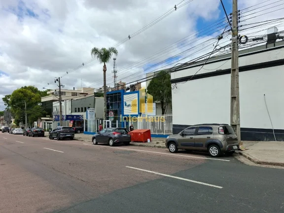 Imagem Imóvel comercial à venda em localização estratégica no Bacacheri, em terreno de esquina com gra...