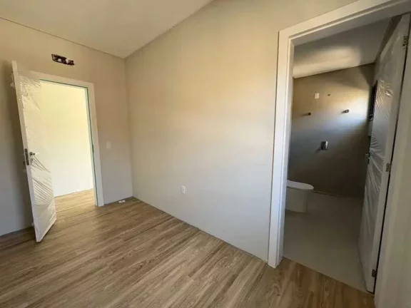 Imagem Casa alto padrão em condomínio com 4 suítes e 4 vagas de garagem em Camboriú/SC