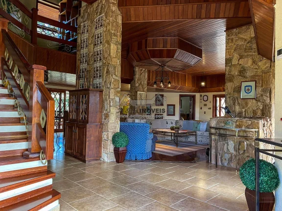 Imagem Casa à venda em Campos do Jordão – Linda casa com 7 suítes