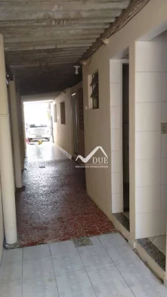 Imagem Casa com 2 dormitórios à venda, 257 m² por R$ 1.100.000,00 - Vila Matias - Santos/SP