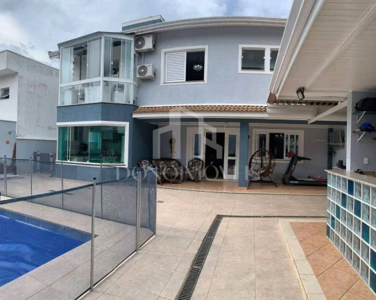 Imagem Casa alto padrão 318m² | 4 suítes | Piscina aquecida | 7 vagas | Swiss Park