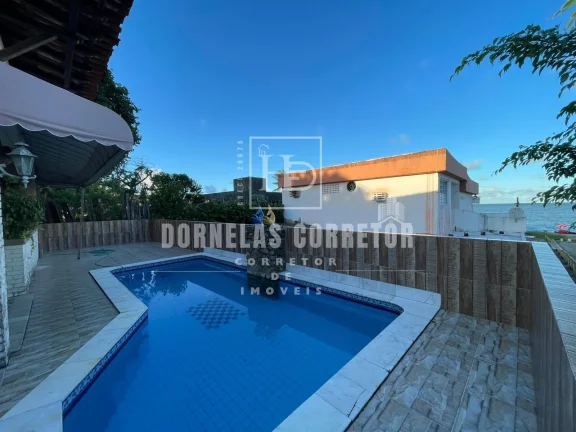 Imagem CASA ALTO PADRÃO COM 5 QUARTOS, DE FRENTE PARA O MAR, NA ESQUINA DA AVENIDA PRINCIPAL