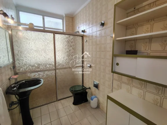 Imagem Imperdível! Apartamento de 3 quartos com suíte e 2 salas em Pitangueiras, Guarujá-SP. 100m² de conforto e elegância.