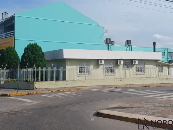 Imagem CASA DE ESQUINA NO CORAÇÃO DA AV. BORGES DE MEDEIROS