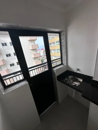 Imagem Imperdível oportunidade: Apartamento à venda em Praia Grande-SP, bairro Tupi, 2 quartos, 1 suíte, 2 salas, 1 vaga, 59m²!