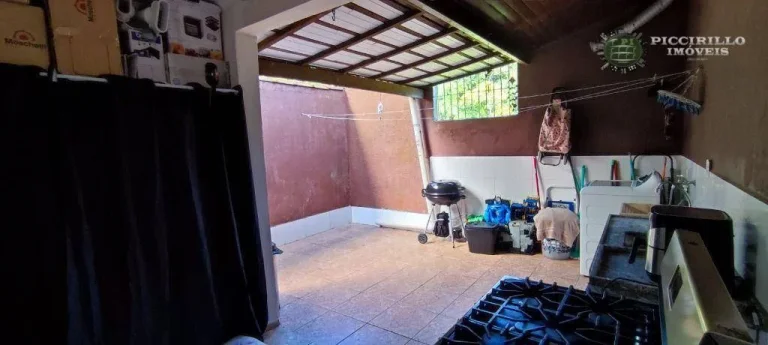 Imagem Sobrado com 3 dormitórios à venda, 118 m² por R$ 680.000,00 - Canto do Forte - Praia Grande/SP