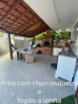 Imagem Vendo ou troco casa com 4 quartos, sendo uma suíte, escritório, varanda, cozinha integrada com sala de estar, piscina, churrasqueira e fogão a lenha.