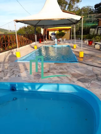 Imagem SÍTIO Á VENDA EXCELENTE OPORTUNIDADE EM ITAMOGI - Varias represas - Piscina - Chalé - Palco para shows