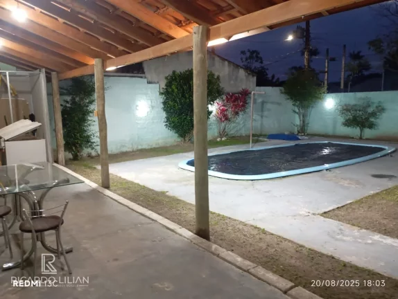Imagem Casa de esquina em Caragua com 3 dormitorios e piscina a venda.