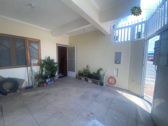 Imagem Sobrado com 3 dormitórios à venda, 110 m² por R$ 680.000,00 - Vila Guilhermina - Praia Grande/SP
