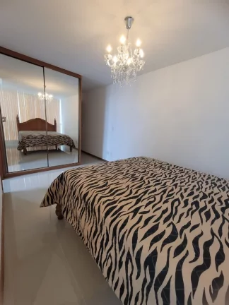 Imagem APARTAMENTO A VENDA COM 3 QUARTOS 1 SUÍTE 2 VAGAS DE GARAGEM NA PRAIA DO MORRO GUARAPARI ES