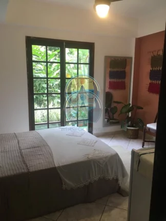 Imagem Casa de Luxo à Venda em Ubatuba-SP, Bairro Promirim: 4 Quartos, 4 Suítes, 2 Salas, 5 Banheiros, 290m². Venha Conferir!