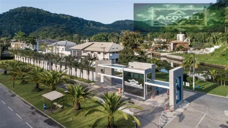 Imagem Casas no Litoral para venda em Guarujá no bairro Acapulco