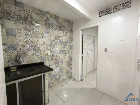 Imagem Casa no 2° Pavimento com 2 Quartos para Locação Anual no Bairro Muquiçaba - Guarapari/ES
