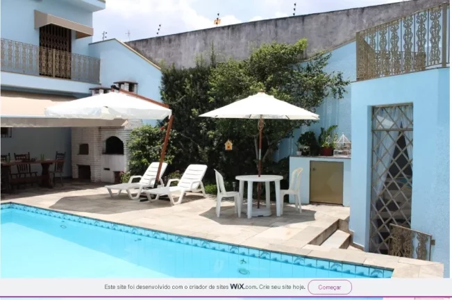 Imagem Casa de Luxo na Vila Ré: 3 Quartos, 3 Suítes, 5 Banheiros, 4 Vagas de Garagem e 426m² de Área em São Paulo-SP.