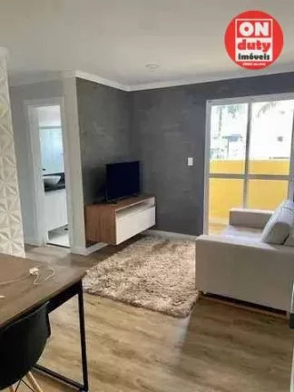Imagem Apartamento com 2 dormitórios à venda, 54 m² por R$ 340.000,00 - Jardim dos Pássaros - Guarujá/SP