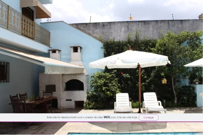 Imagem Casa de Luxo na Vila Ré: 3 Quartos, 3 Suítes, 5 Banheiros, 4 Vagas de Garagem e 426m² de Área em São Paulo-SP.
