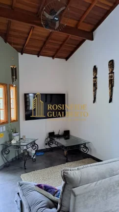 Imagem Casa Elegante com 4 Dormitórios a 700 metros da praia de Massaguaçu.