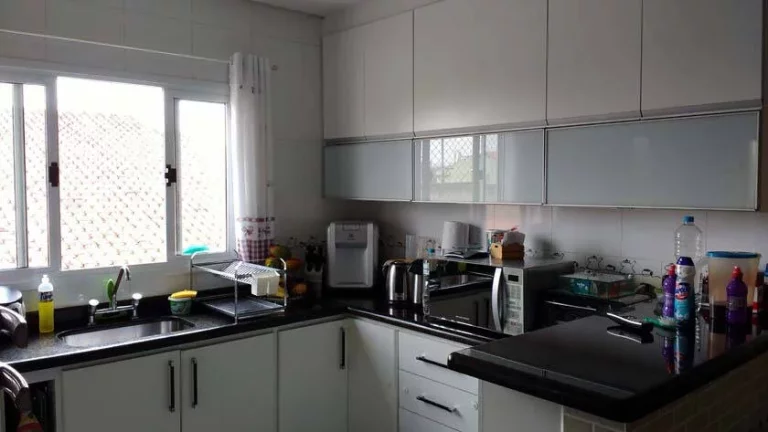 Imagem Sobrado com 243 m² 4 Suítes, 7 Vagas, Quintal com Churrasqueira