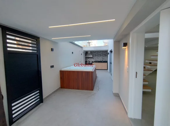 Imagem Casa Nova com 3 dormitórios e jacuzzi no bairro Ponta da Praia em Santos por R$2.200.000,00