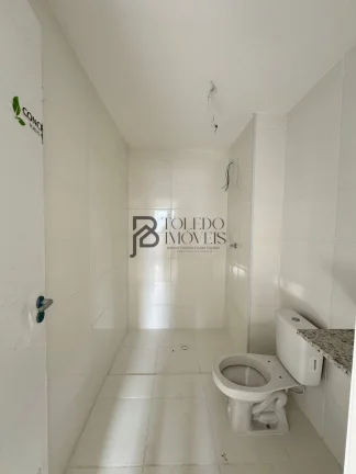 Imagem Apartamento de 2 dormitórios sendo 1 suíte, prédio frente mar no bairro Vila Mirim - Praia Grande